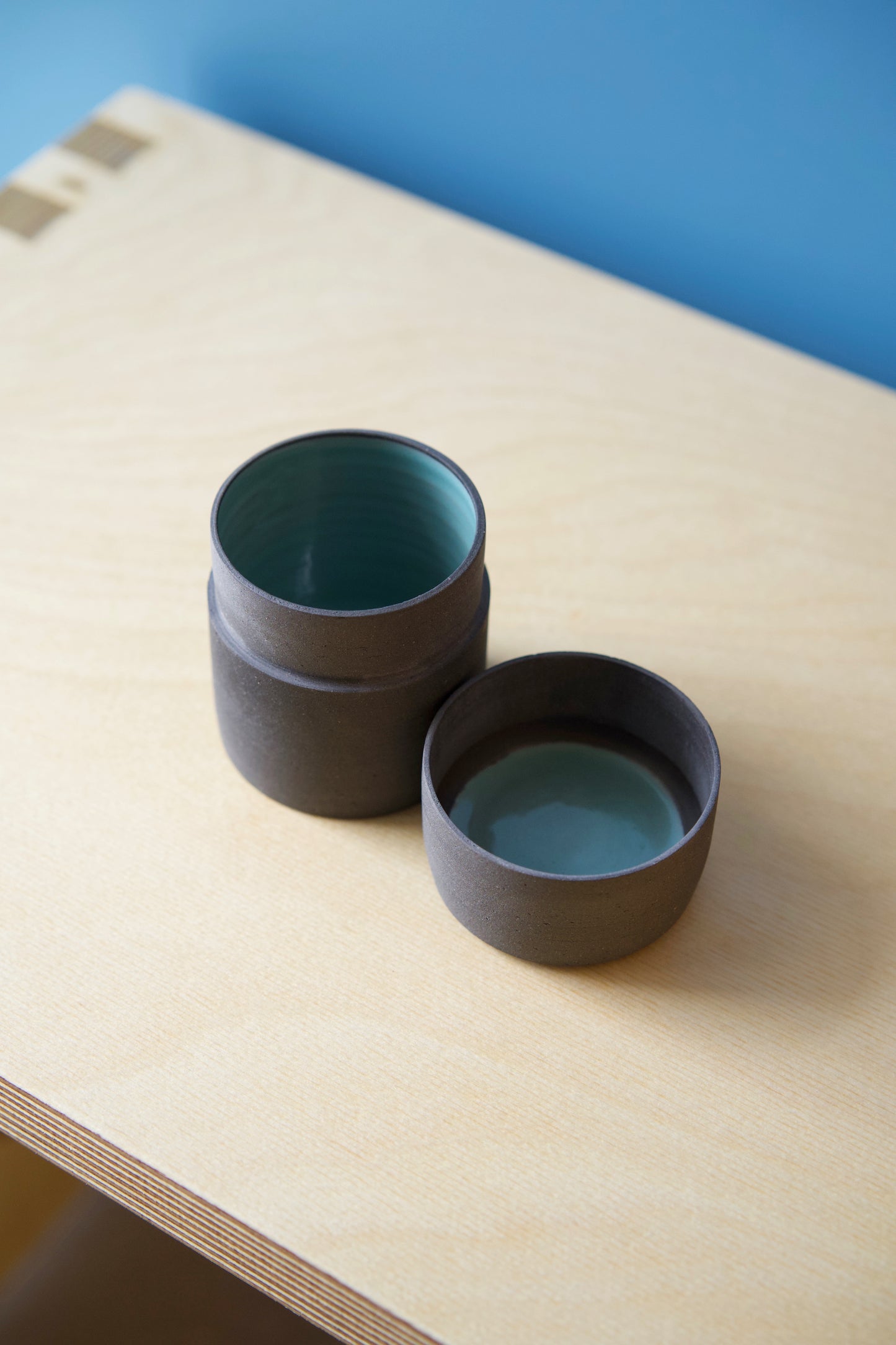 Small lidded jar, glossy turquoise glaze